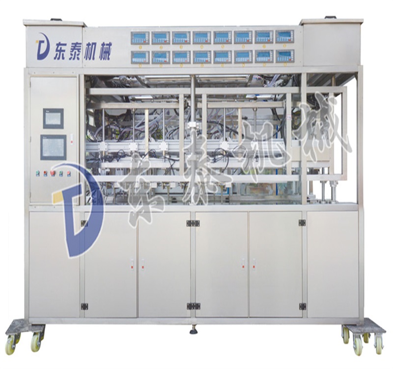 全自動稱重式灌裝機.jpg 全自動稱重式灌裝機.jpg